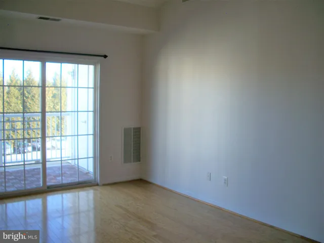 a view of a kitchen with a sink