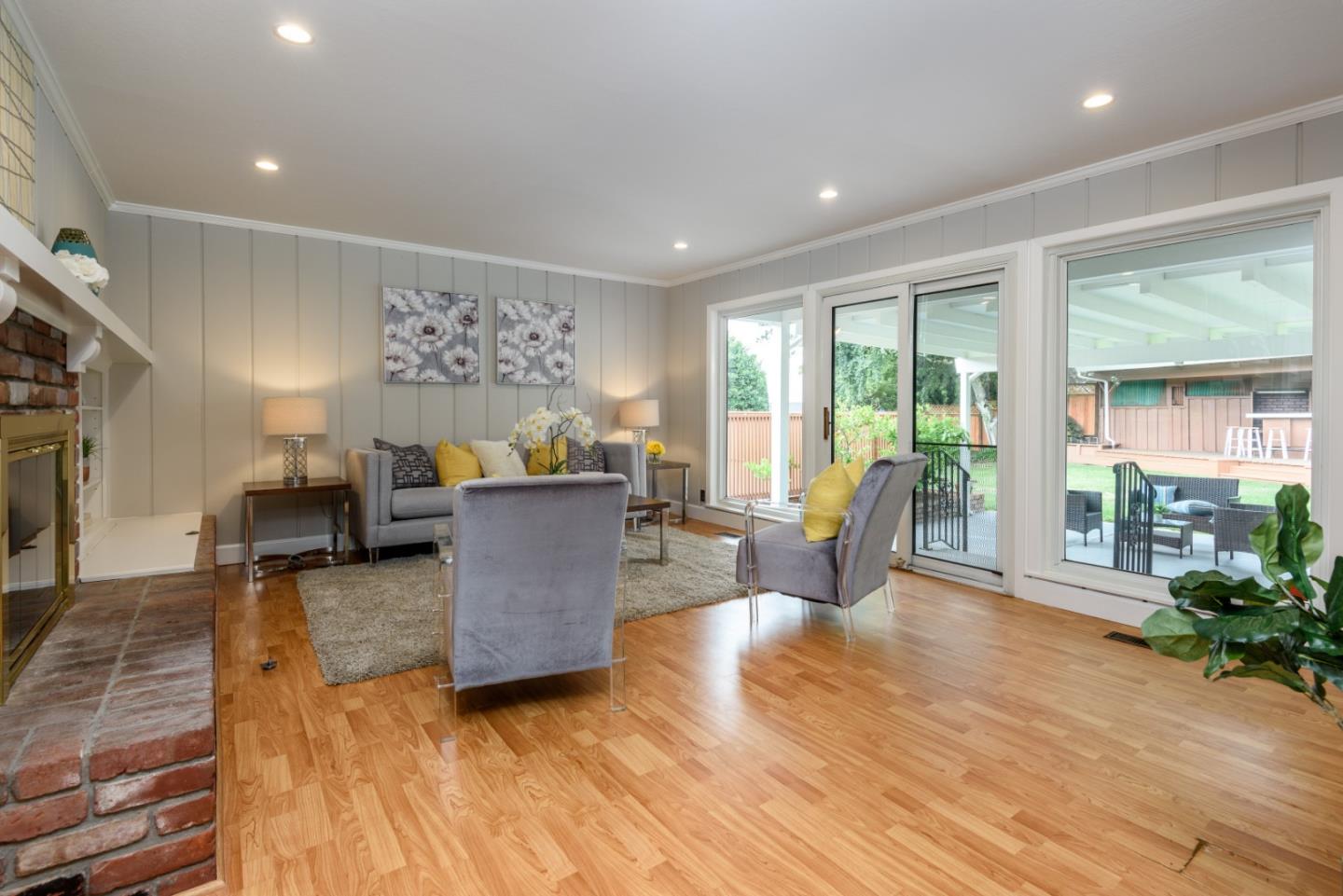 95 Avondale Road Hillsborough, CA 94010 - Photo 11 of 25 a living room with furniture and a large window