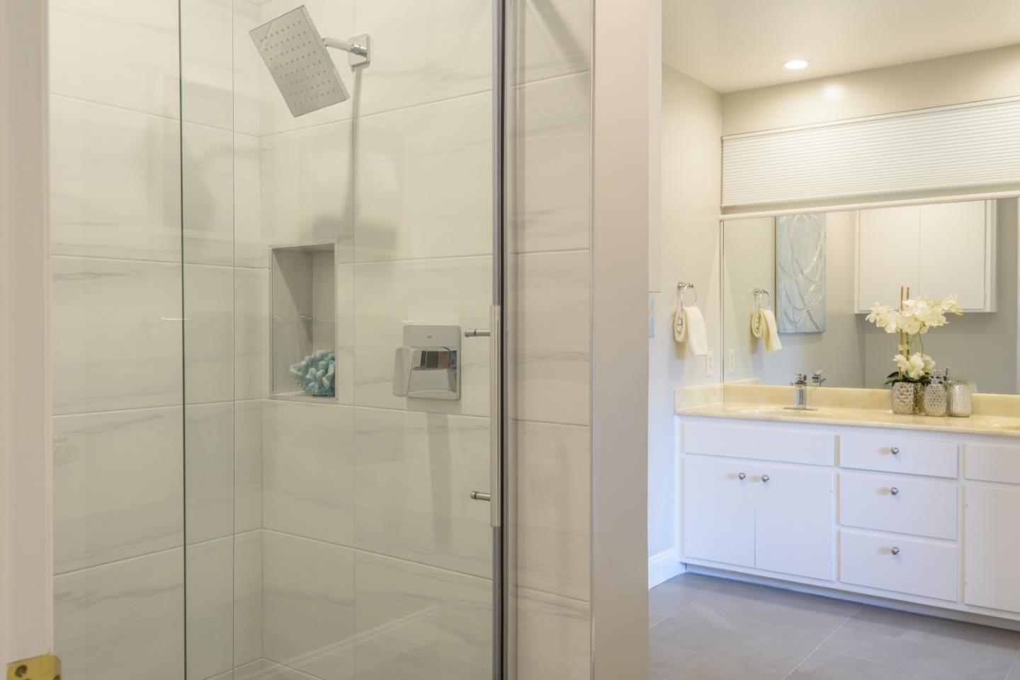 95 Avondale Road Hillsborough, CA 94010 - Photo 15 of 25 a bathroom with a shower and a sink