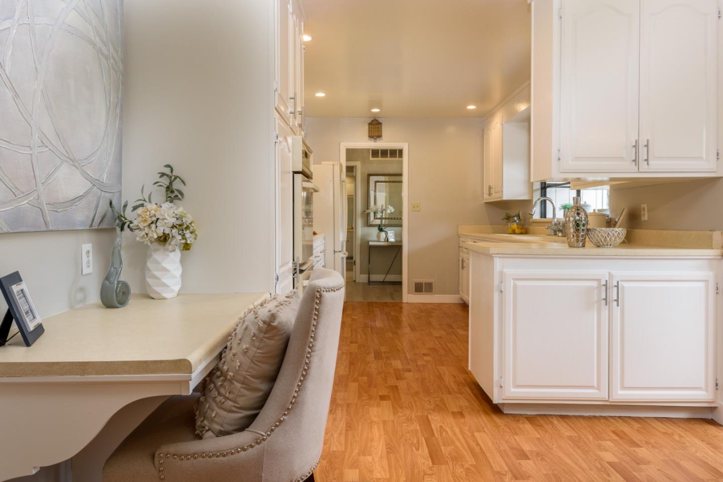 95 Avondale Road Hillsborough, CA 94010 - Photo 10 of 25 a dining room with furniture and wooden floor