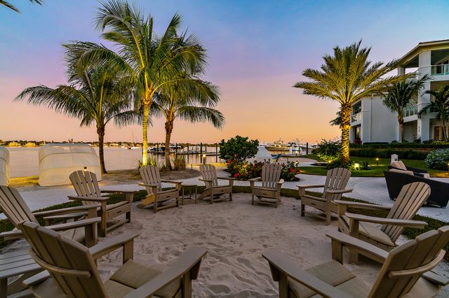 a view of a building with a yard