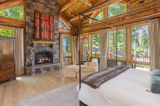 a bathroom with a large tub and shower