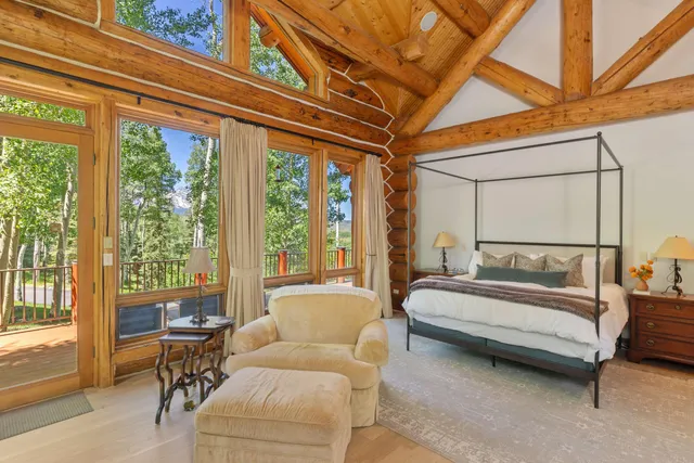 a view of a balcony with furniture