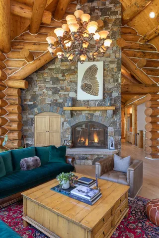 a room with furniture pool table and windows