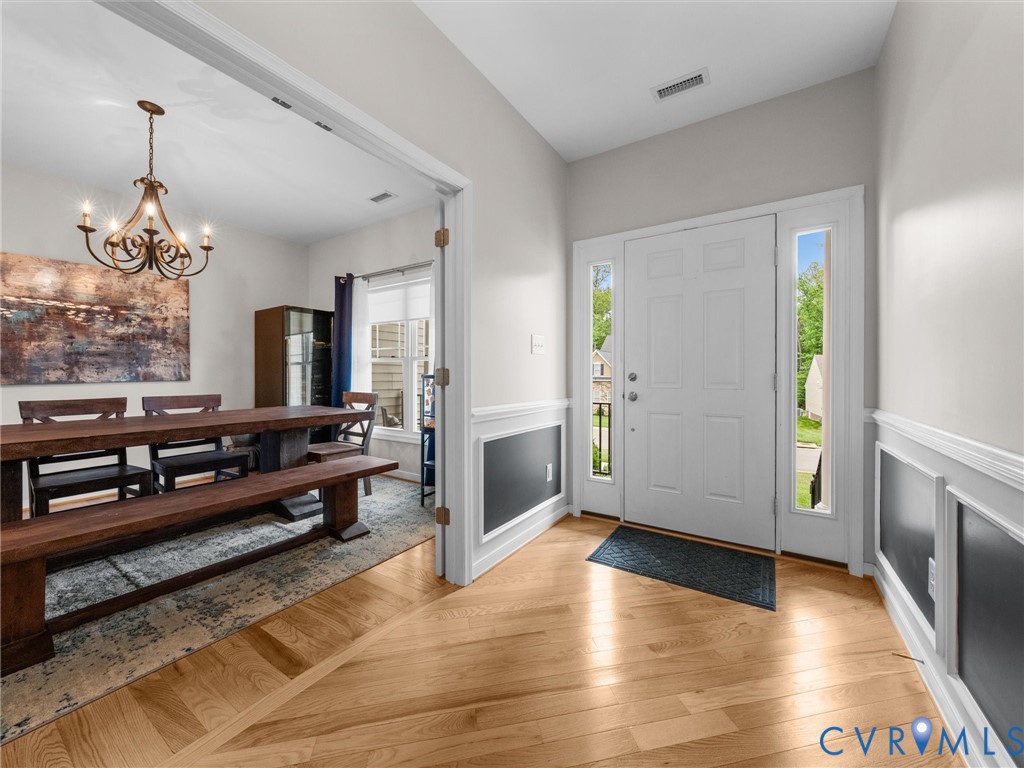 10824 Avening Road Chesterfield, VA 23832 - Photo 7 of 47 a large living room with a couch