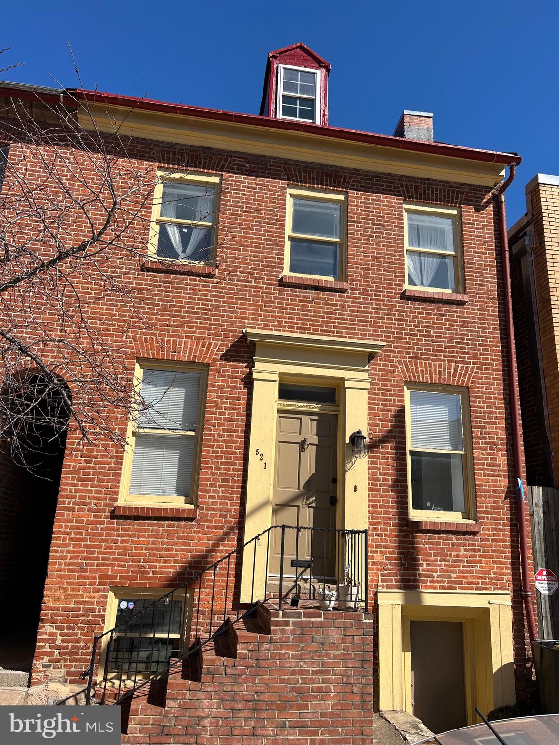 521 South Wolfe Street, Unit 1F Baltimore, MD 21231 - Photo 1 of 10 a front view of a building