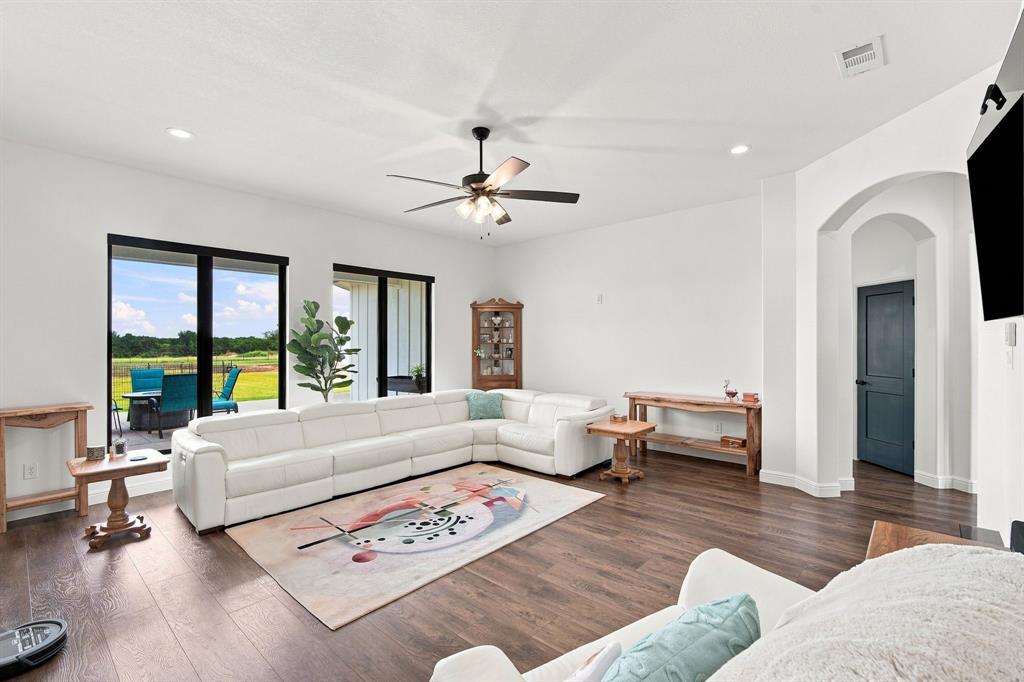 140 Lone Elm Road Midlothian, TX 76065 - Photo 9 of 36 Open living room with comfortable layout.