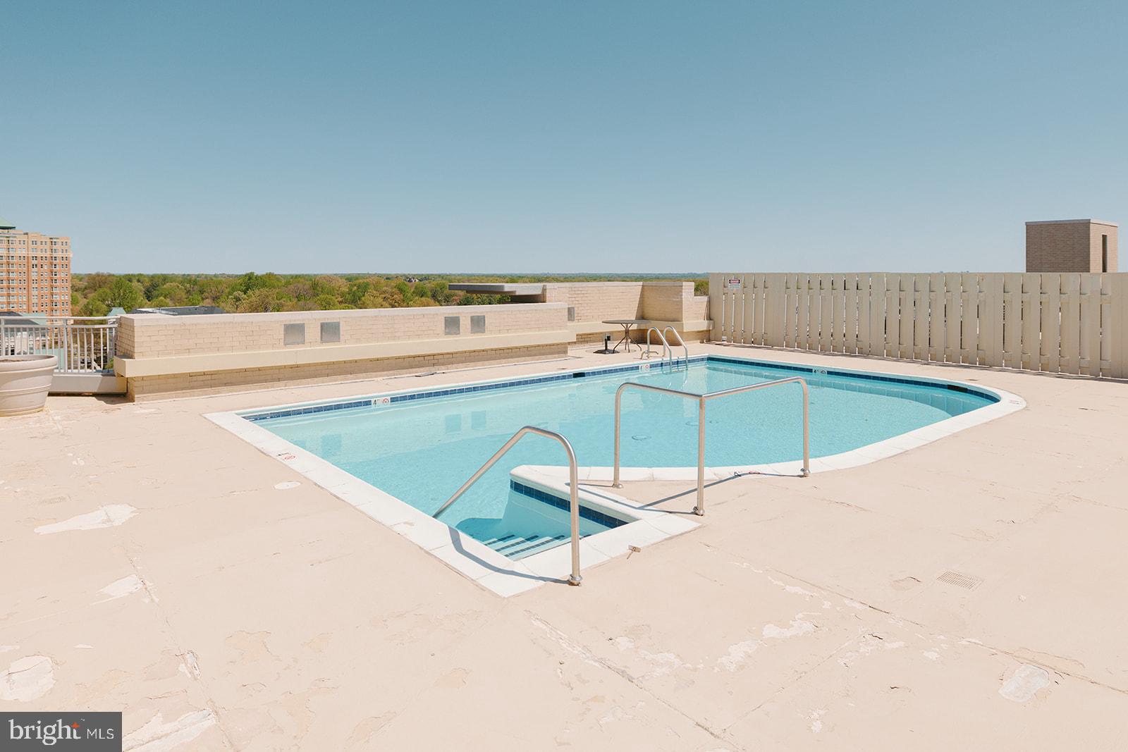 11800 Sunset Hills Road, Unit 506 Reston, VA 20190 - Photo 23 of 30 view of a swimming pool with a lounge chair