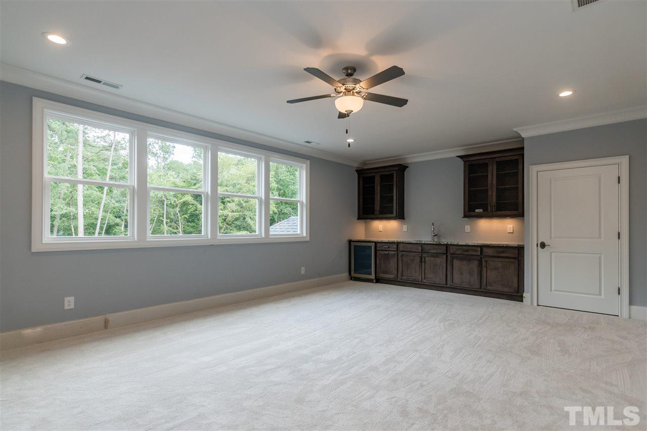 5412 Winding View Lane Raleigh, NC 27615 - Photo 18 of 30 a living room with furniture and a window
