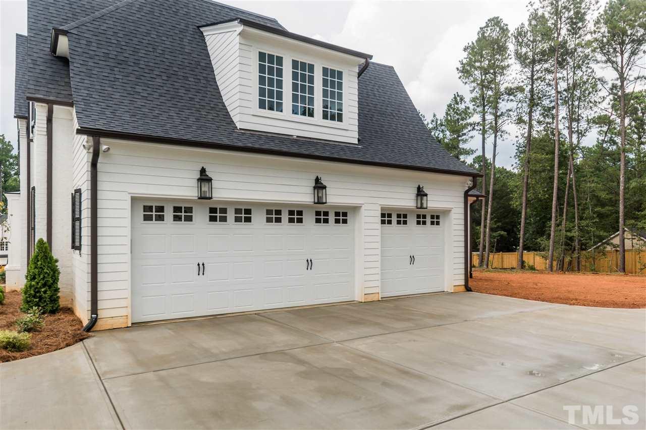 5412 Winding View Lane Raleigh, NC 27615 - Photo 27 of 30 a view of a house with backyard and trees