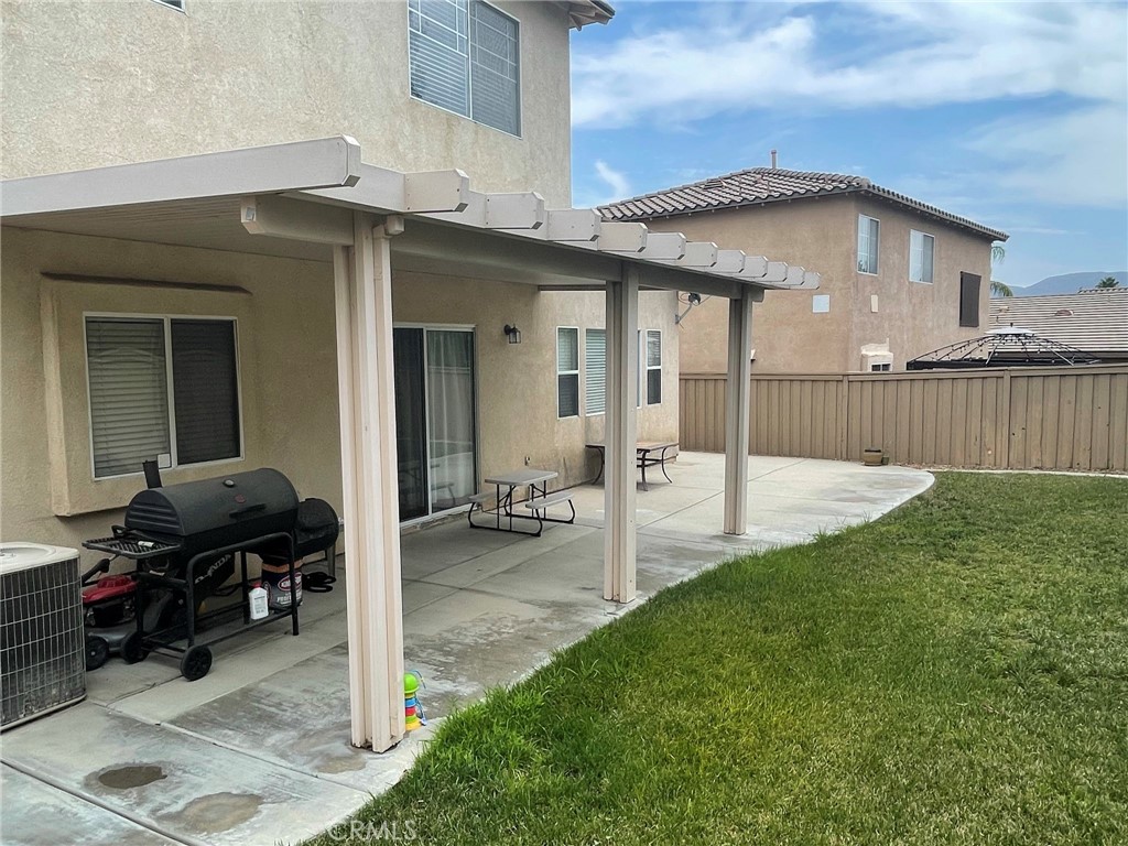 43093 Teramo Street Temecula, CA 92592 - Photo 12 of 13 a view of a house with backyard and porch