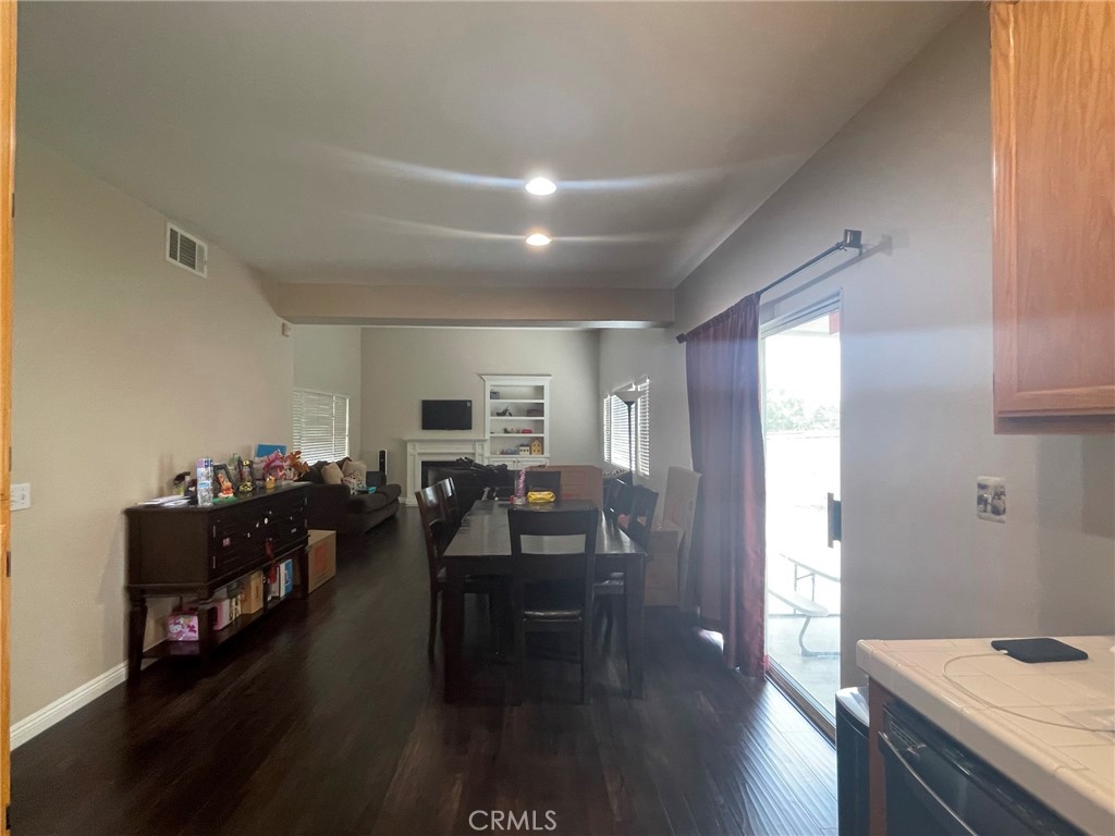 43093 Teramo Street Temecula, CA 92592 - Photo 6 of 13 a living room with furniture and wooden floor