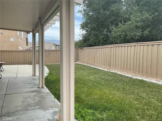 a view of backyard with green space