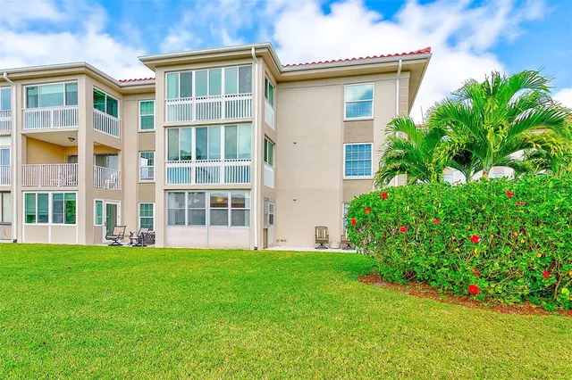 a spacious bedroom with a bed and a window