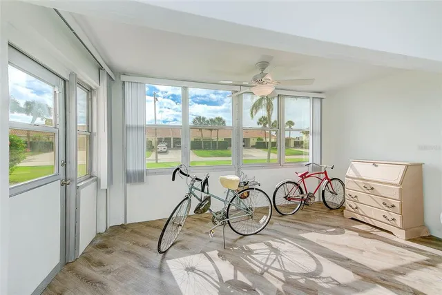 a living room with fireplace furniture and a flat screen tv
