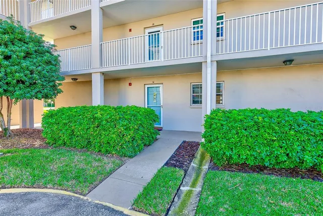 a view of swimming pool with seating area