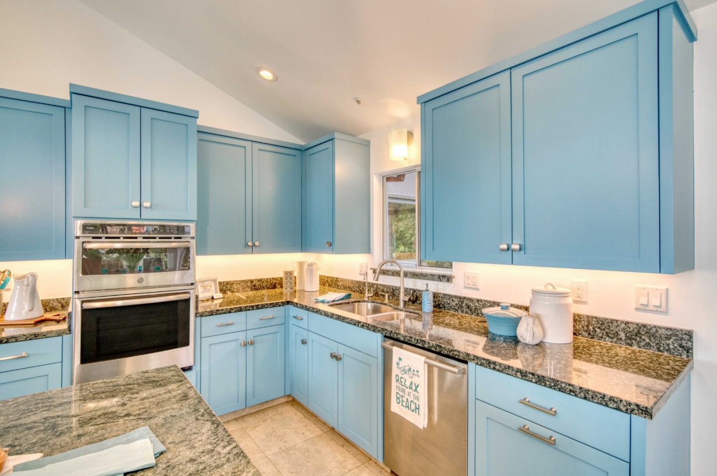 7325 Viewpoint Road Aptos, CA 95003 - Photo 12 of 51 a kitchen with stainless steel appliances granite countertop a sink stove and cabinets