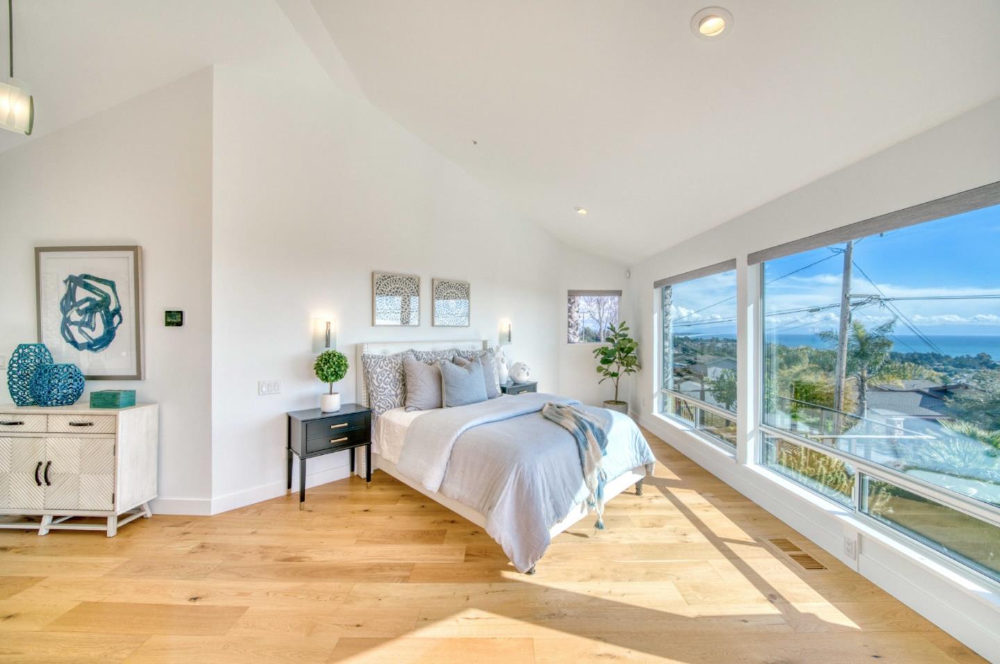 7325 Viewpoint Road Aptos, CA 95003 - Photo 21 of 51 a bedroom with a bed and a large window