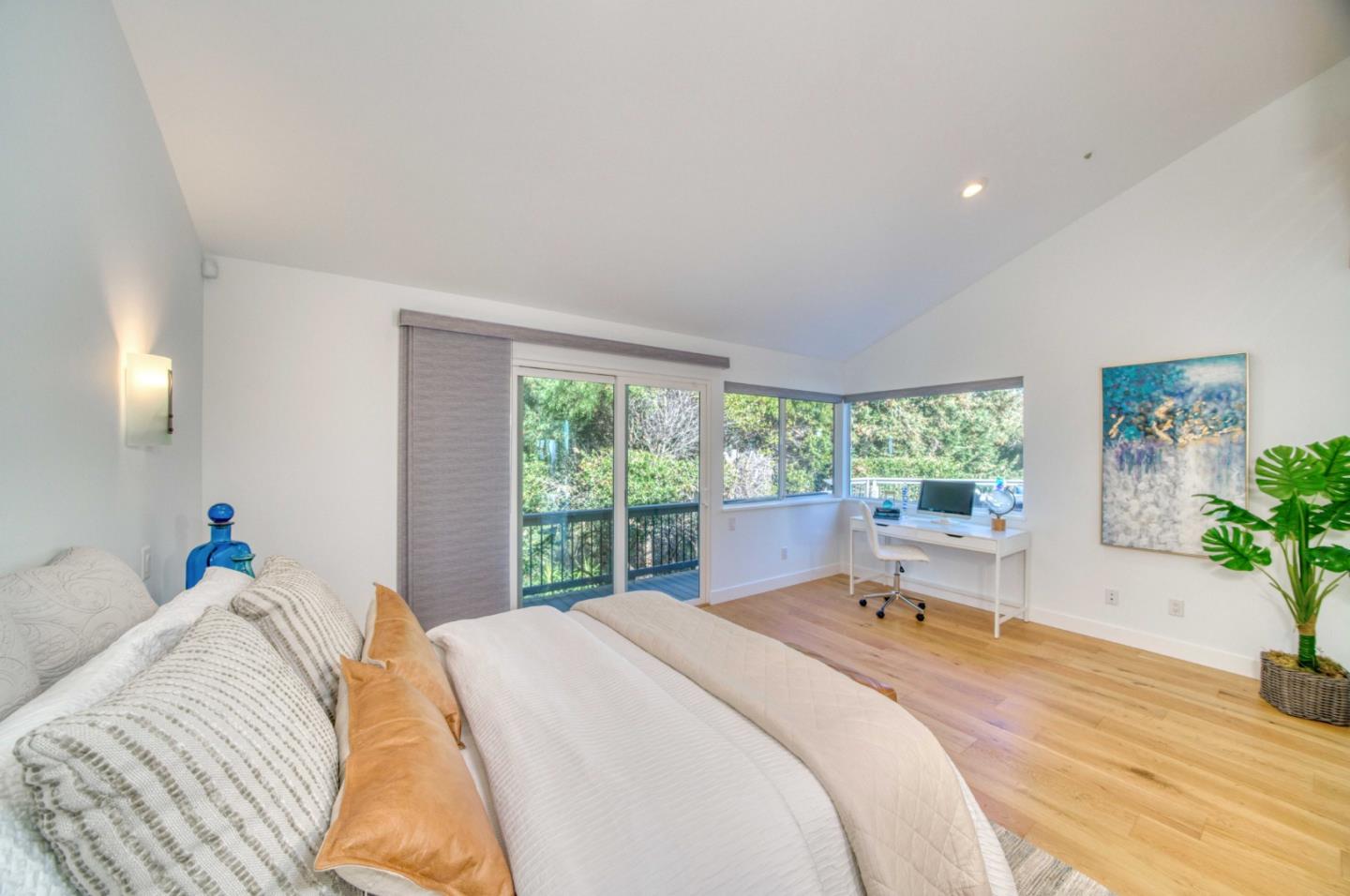 7325 Viewpoint Road Aptos, CA 95003 - Photo 29 of 51 a bed sitting in a bedroom next to a window
