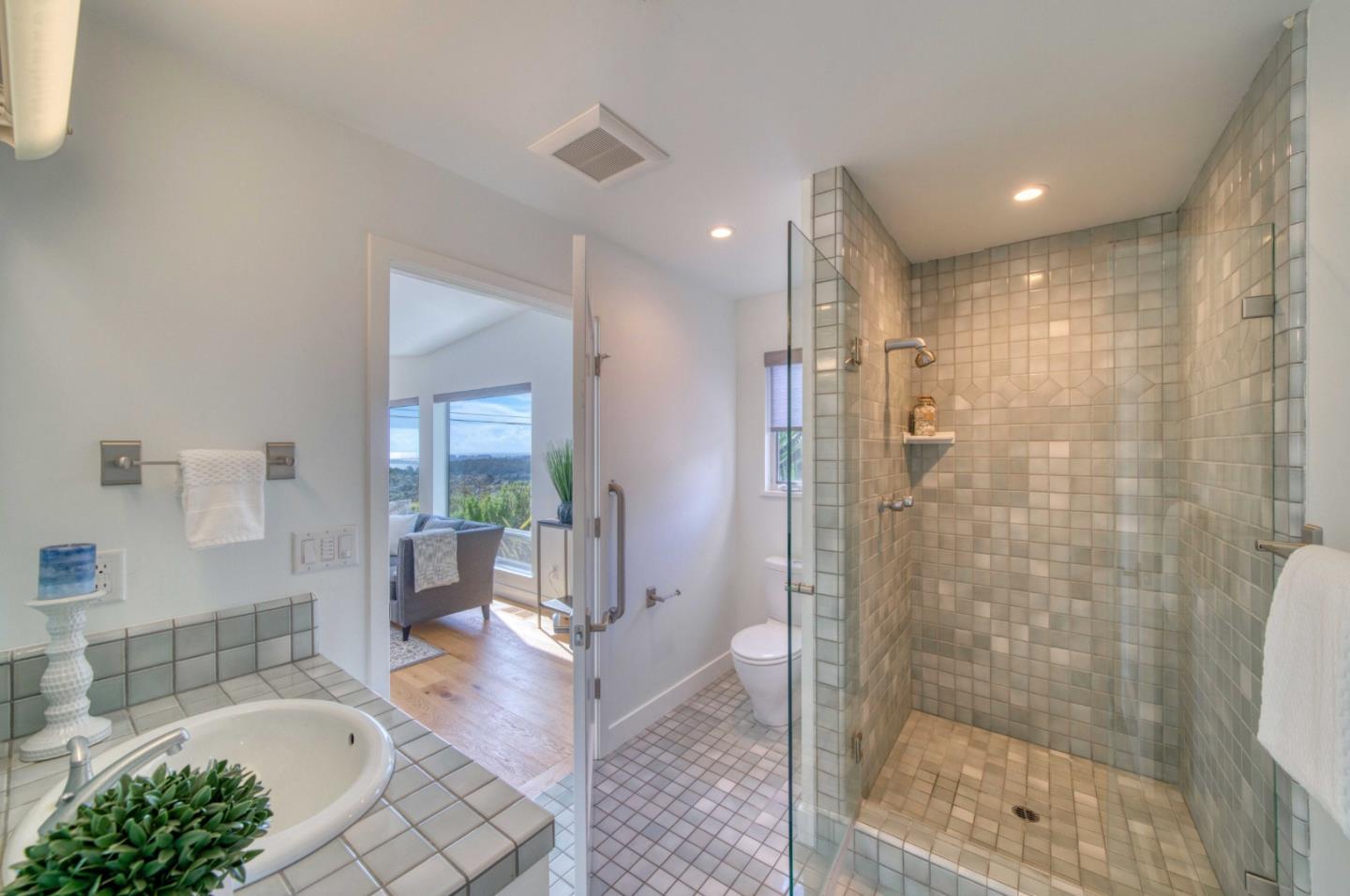 7325 Viewpoint Road Aptos, CA 95003 - Photo 30 of 51 a bathroom with a bathtub and a shower