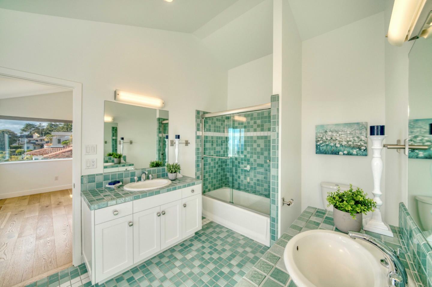 7325 Viewpoint Road Aptos, CA 95003 - Photo 35 of 51 a spacious bathroom with a granite countertop tub sink and mirror