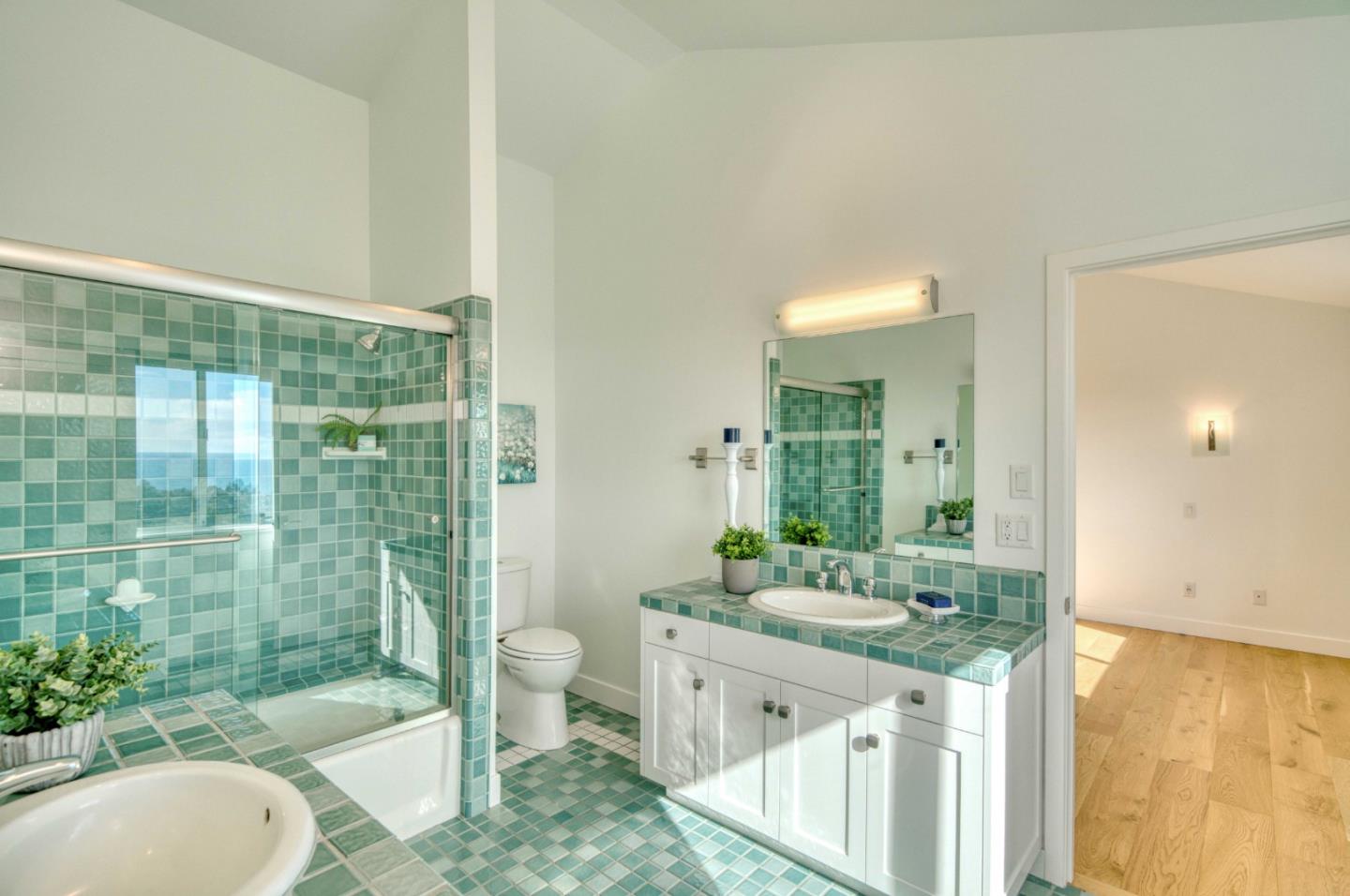 7325 Viewpoint Road Aptos, CA 95003 - Photo 36 of 51 a bathroom with a double vanity sink toilet and shower