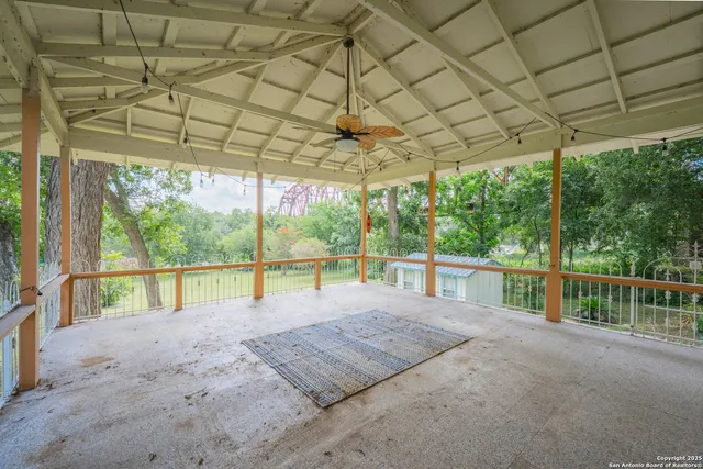 a view of an empty room with wooden building