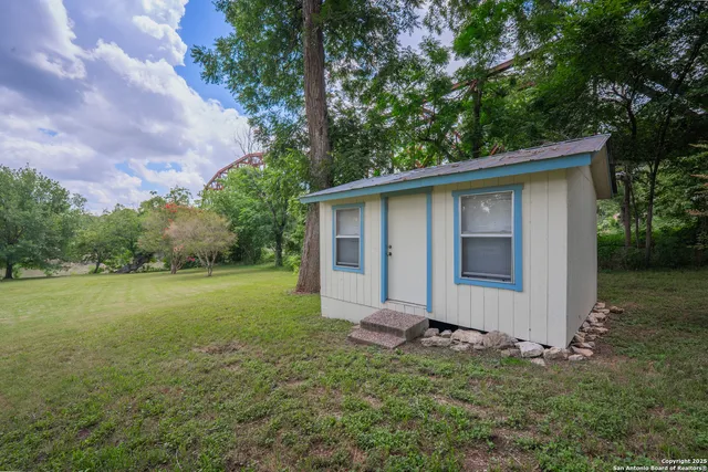 a view of a wooden bridge and lake view