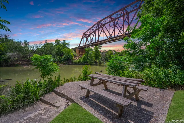 a view of a bench in a garden
