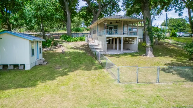 a view of swimming pool with a garden