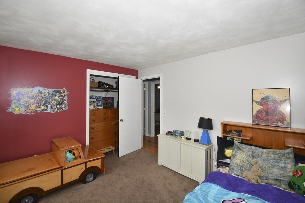 39 Tanglewood Road Sterling, MA 01564 - Photo 19 of 30 a room with furniture and air hockey table