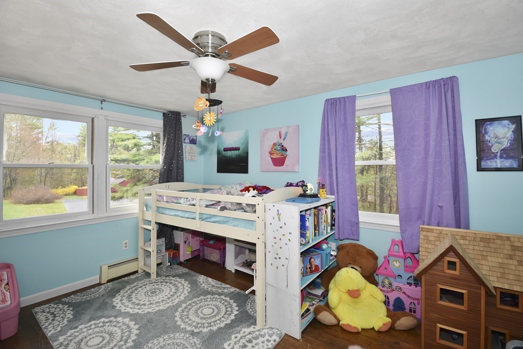 39 Tanglewood Road Sterling, MA 01564 - Photo 21 of 30 a bedroom with a bed dresser and a window