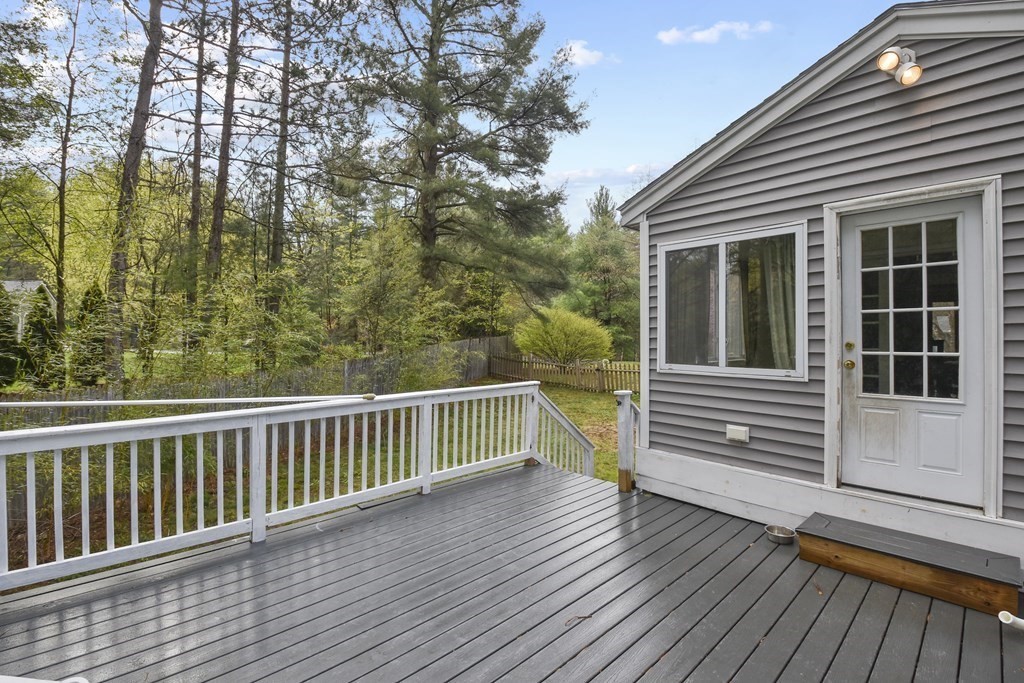 39 Tanglewood Road Sterling, MA 01564 - Photo 27 of 30 a view of a balcony with wooden floor and fence