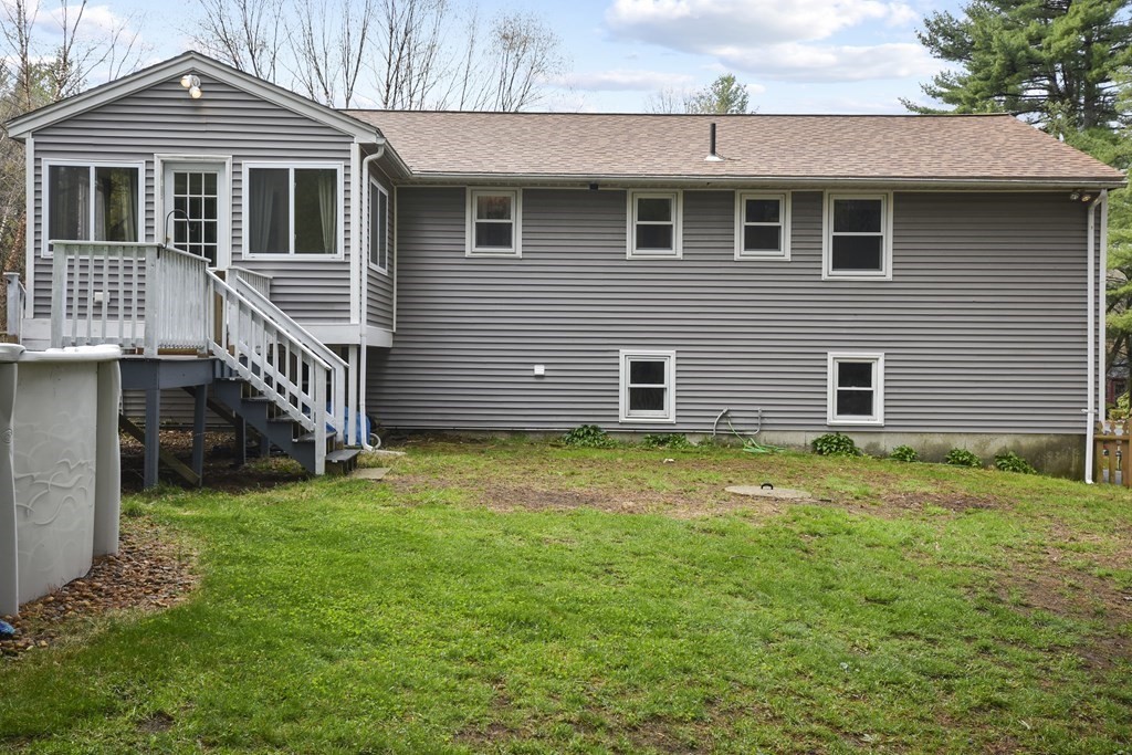 39 Tanglewood Road Sterling, MA 01564 - Photo 29 of 30 a view of a house with a yard