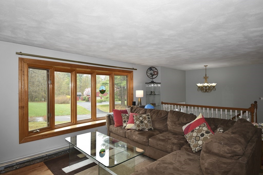39 Tanglewood Road Sterling, MA 01564 - Photo 4 of 30 a living room with furniture and a large window