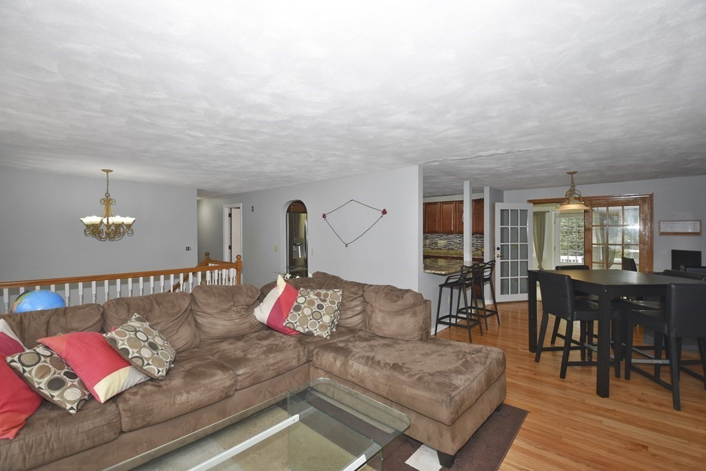 39 Tanglewood Road Sterling, MA 01564 - Photo 7 of 30 a living room with furniture and wooden floor