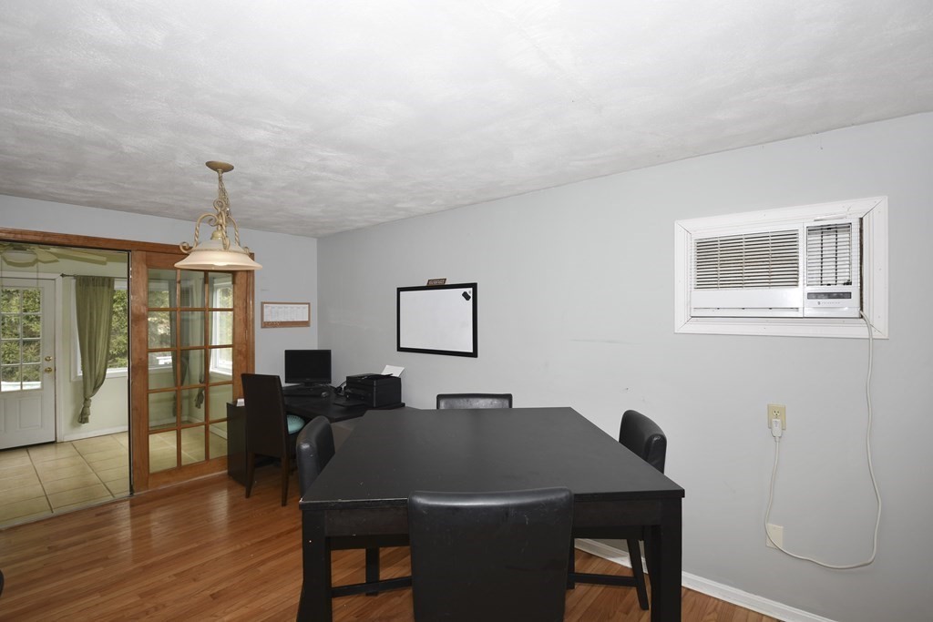 39 Tanglewood Road Sterling, MA 01564 - Photo 8 of 30 a view of a dining room with furniture window and wooden floor