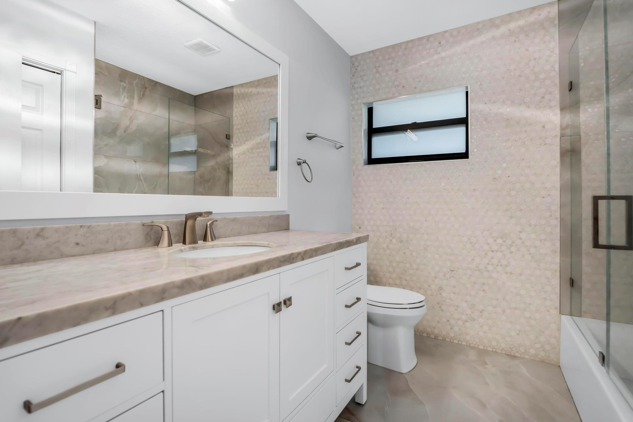18201 Southwest 70th Place Southwest Ranches, FL 33331 - Photo 22 of 55 a bathroom with a granite countertop sink mirror vanity and toilet