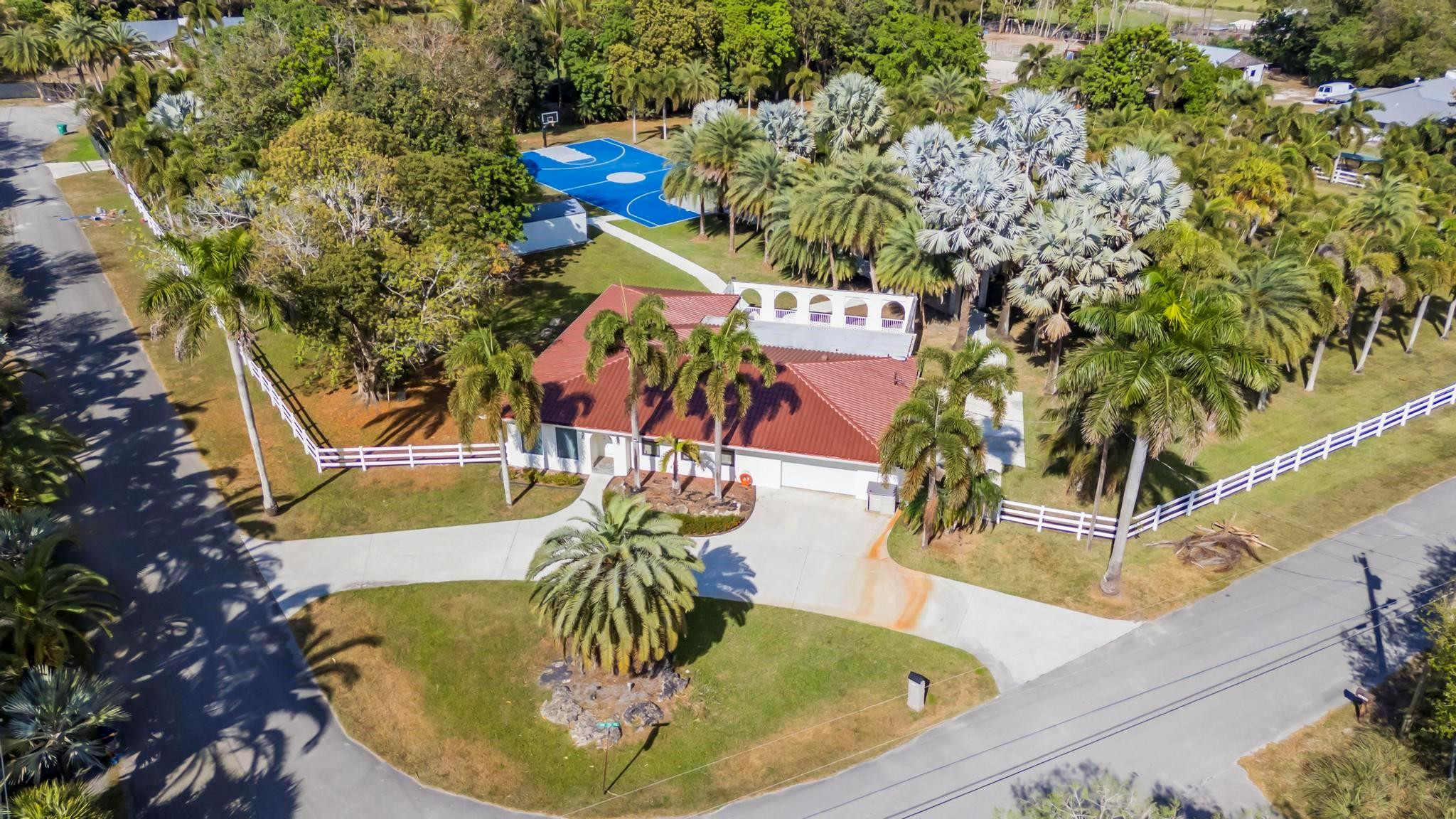 18201 Southwest 70th Place Southwest Ranches, FL 33331 - Photo 32 of 55 a view of a swimming pool with a patio