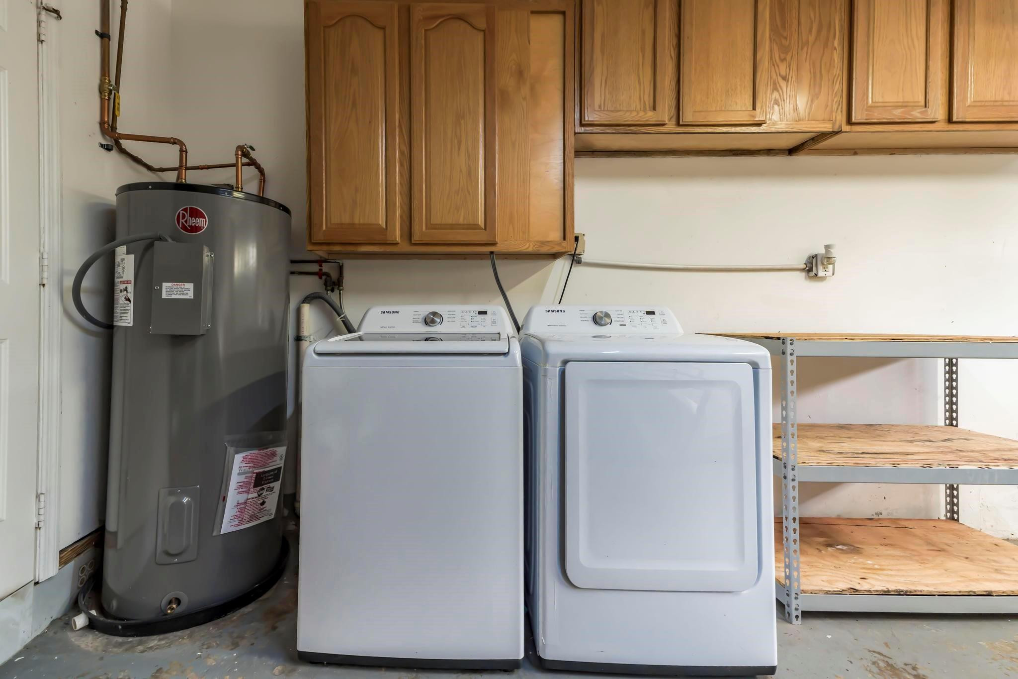 18201 Southwest 70th Place Southwest Ranches, FL 33331 - Photo 52 of 55 a utility room with dryer and washer