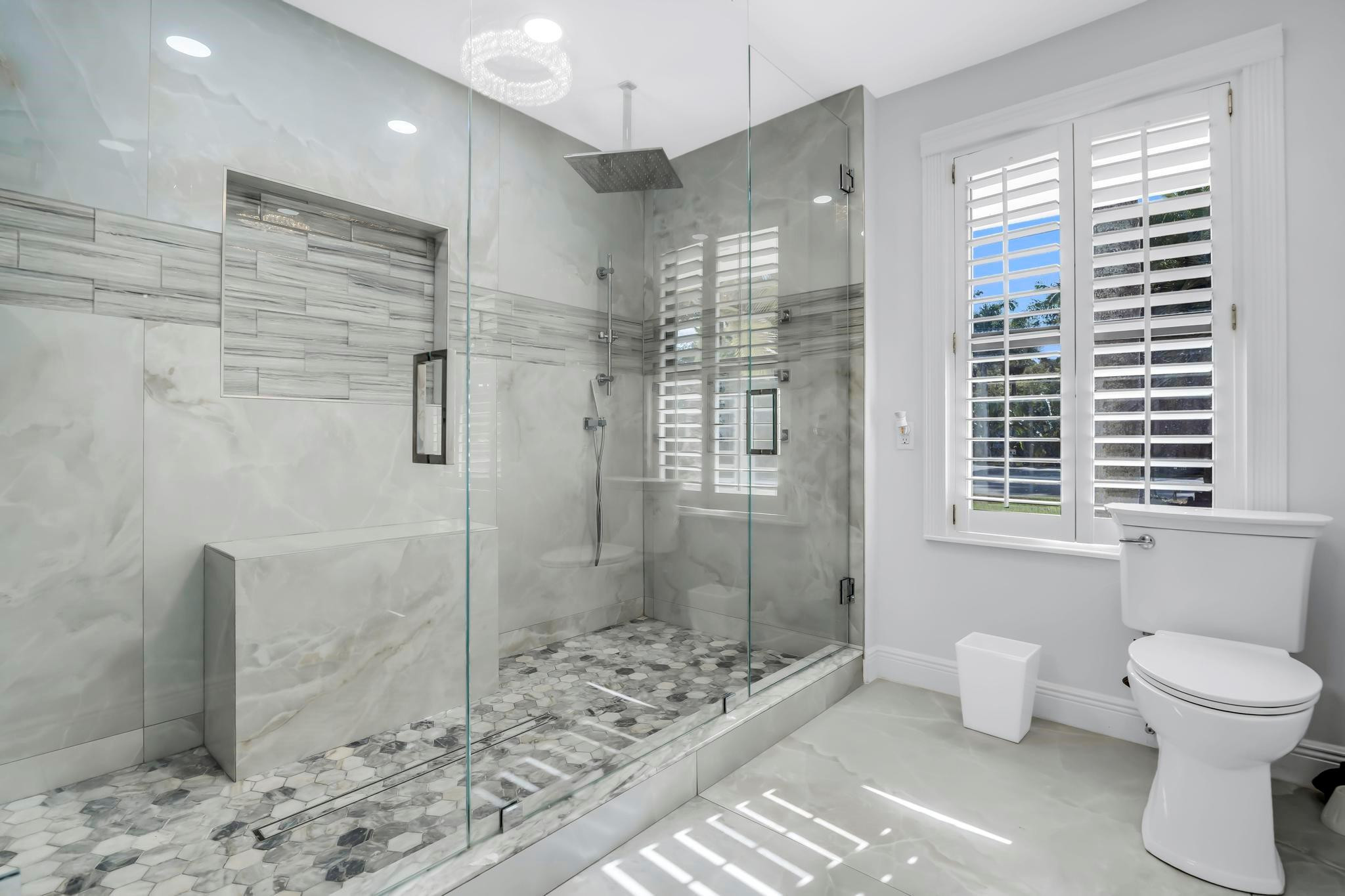 18201 Southwest 70th Place Southwest Ranches, FL 33331 - Photo 9 of 55 a bathroom with a toilet and a shower