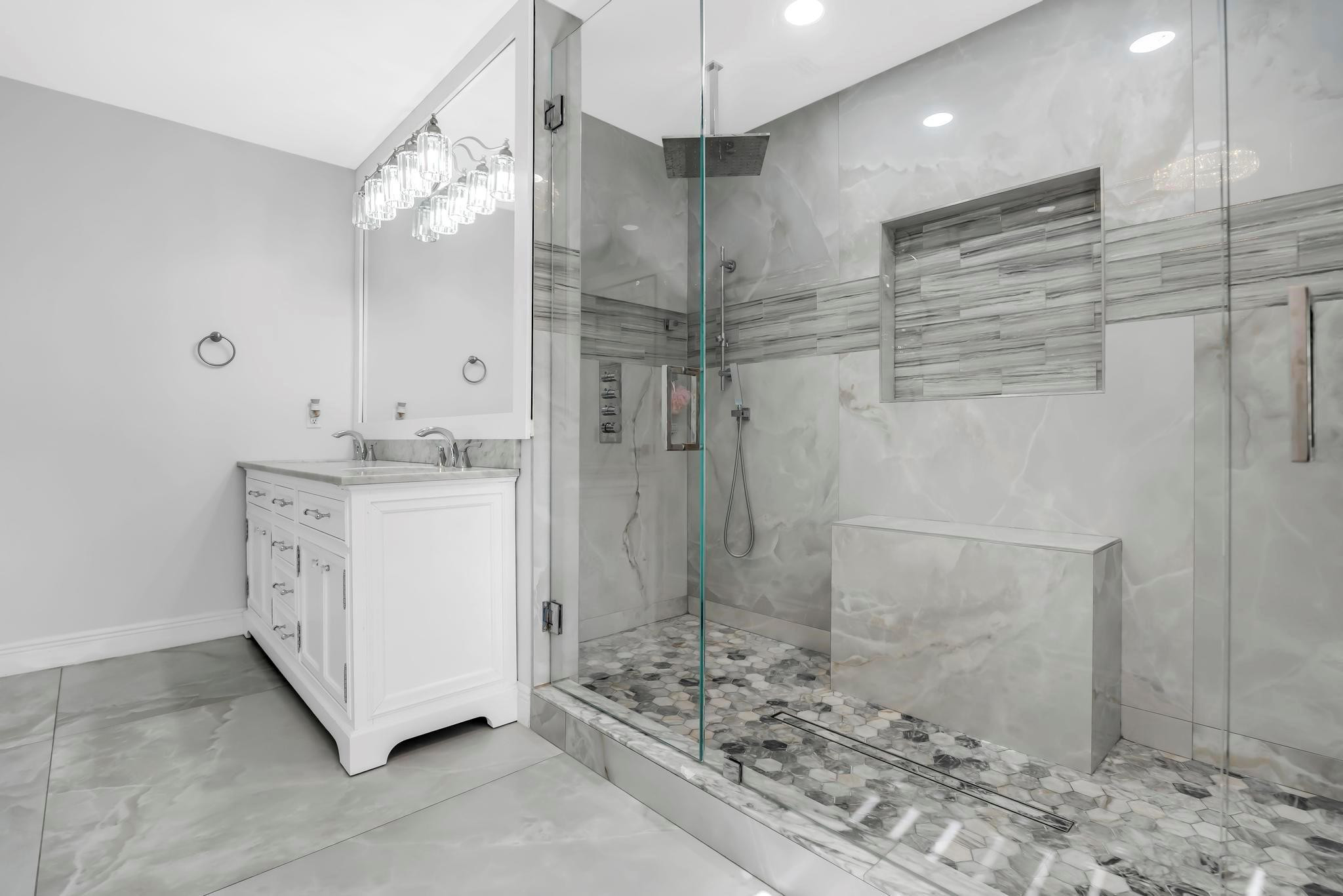 18201 Southwest 70th Place Southwest Ranches, FL 33331 - Photo 10 of 55 a bathroom with a sink shower and a mirror