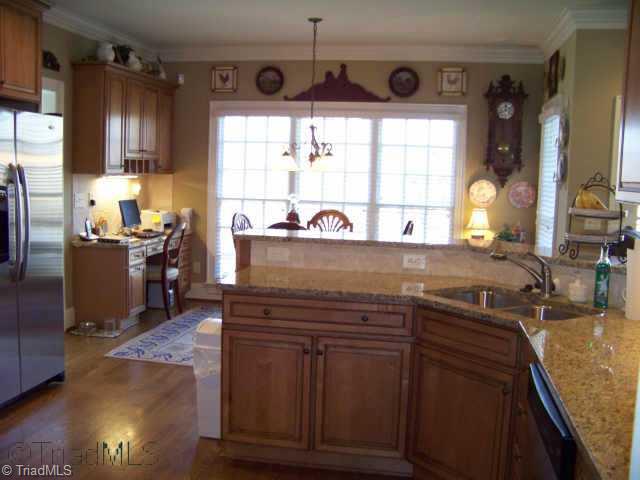 1387 Abbotts Creek Church Road High Point, NC 27265 - Photo 3 of 9 Other. This gourmet kitchen features a gas cooktop,granite stainless,computer nook and breakfast area.There is a large pantry and a second set of stairs to the second level.It is near the garage door and laundry room with sink and storage closet.