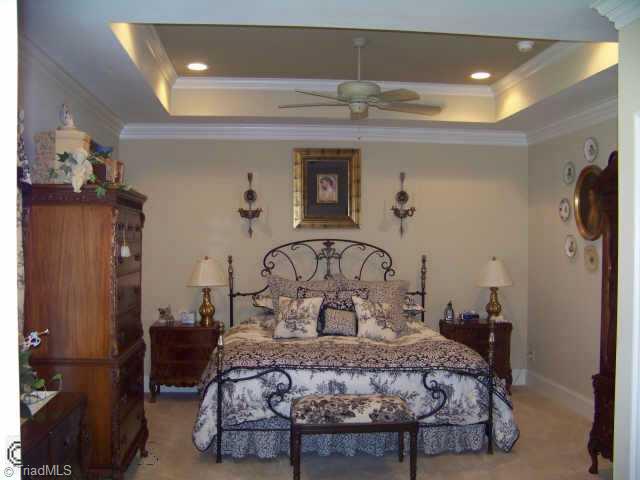1387 Abbotts Creek Church Road High Point, NC 27265 - Photo 4 of 9 Other. The main level master suite has sitting area,tray ceiling and huge adjoining bath featuring jetted tub,large shower,his and hers closets and double sinks.