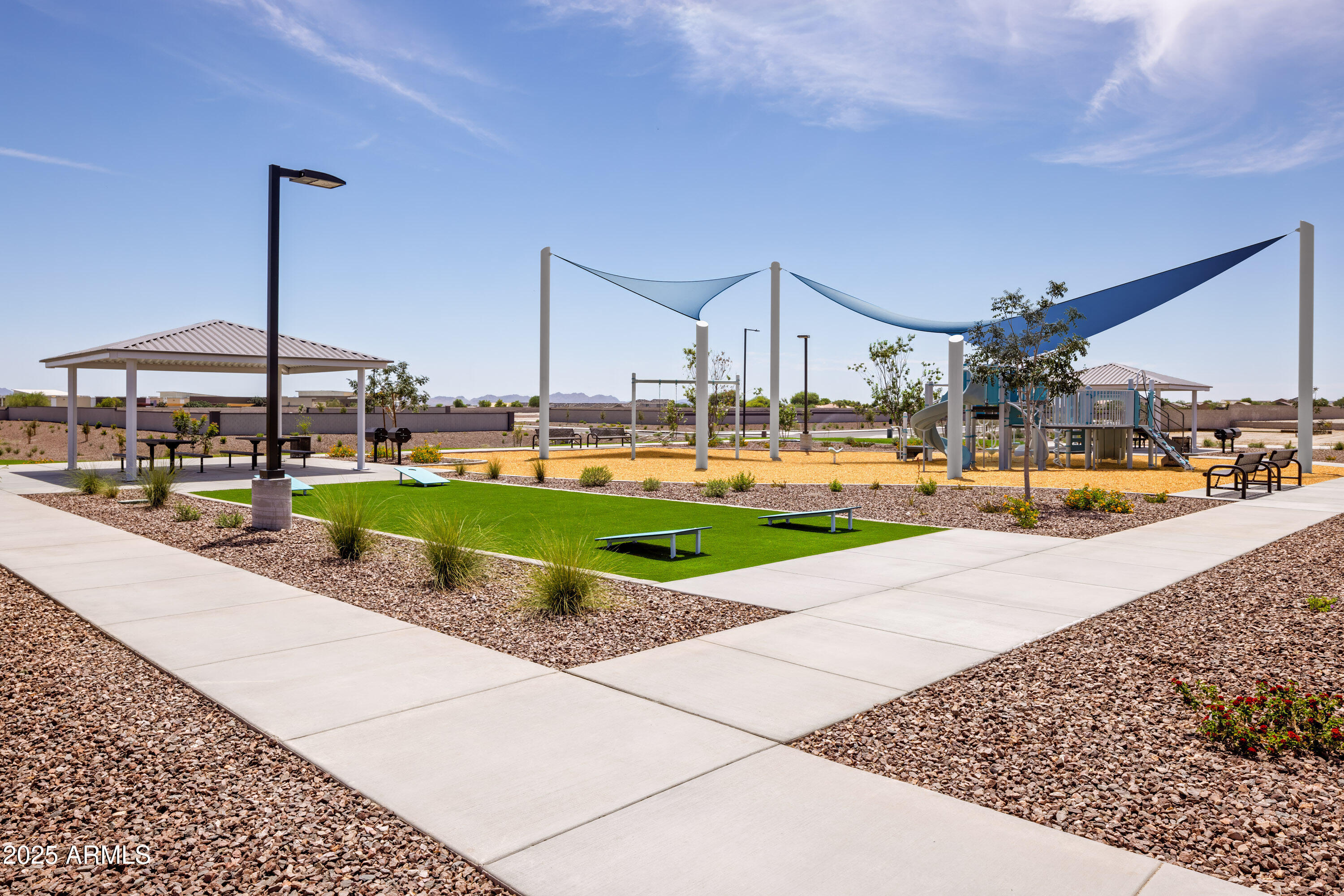 24154 West Carver Road Buckeye, AZ 85326 - Photo 50 of 54 a view of a water fountain and a yard