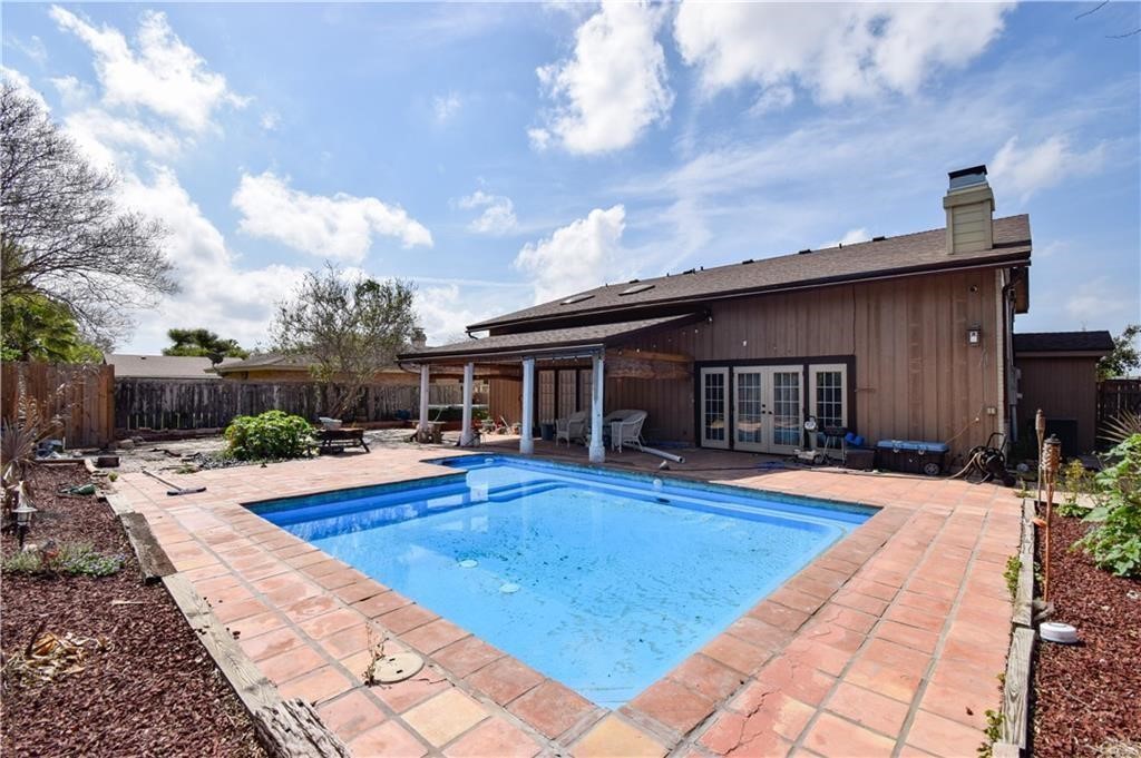 4410 Hebert Lane Corpus Christi, TX 78413 - Photo 7 of 34 a view of a house with swimming pool and sitting area