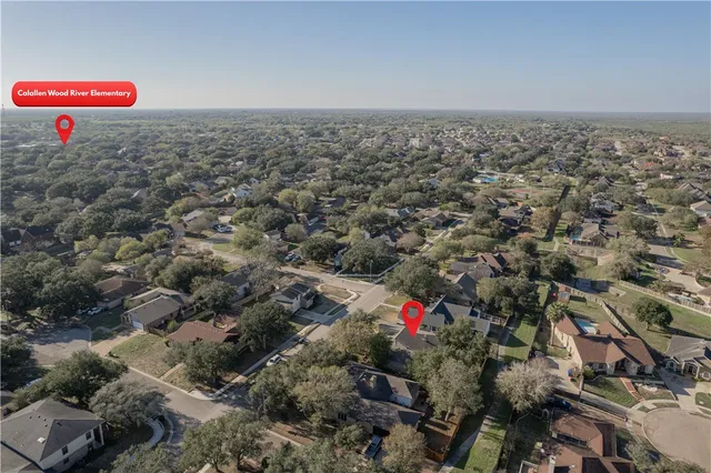 a view of a road with a building in the background