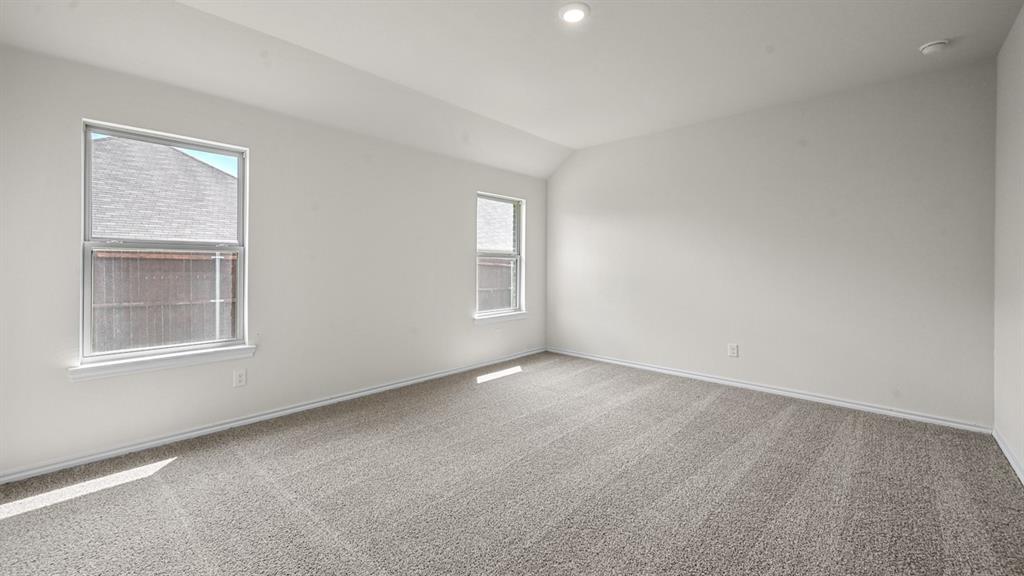 6088 Freedom Drive Lindale, TX 75706 - Photo 26 of 40 an empty room with windows