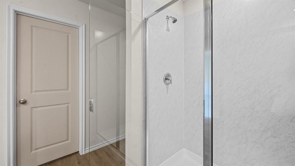 6088 Freedom Drive Lindale, TX 75706 - Photo 28 of 40 a view of a bathroom from the hallway