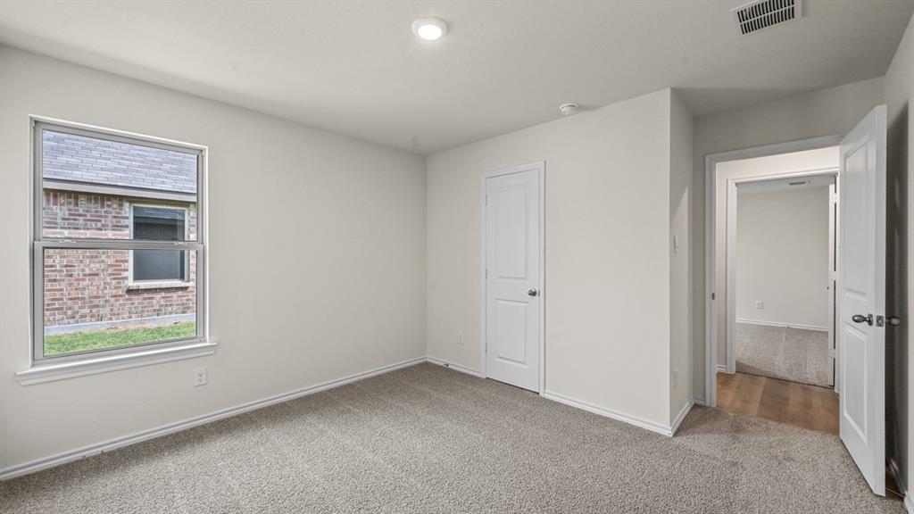 6088 Freedom Drive Lindale, TX 75706 - Photo 36 of 40 a view of an empty room and window